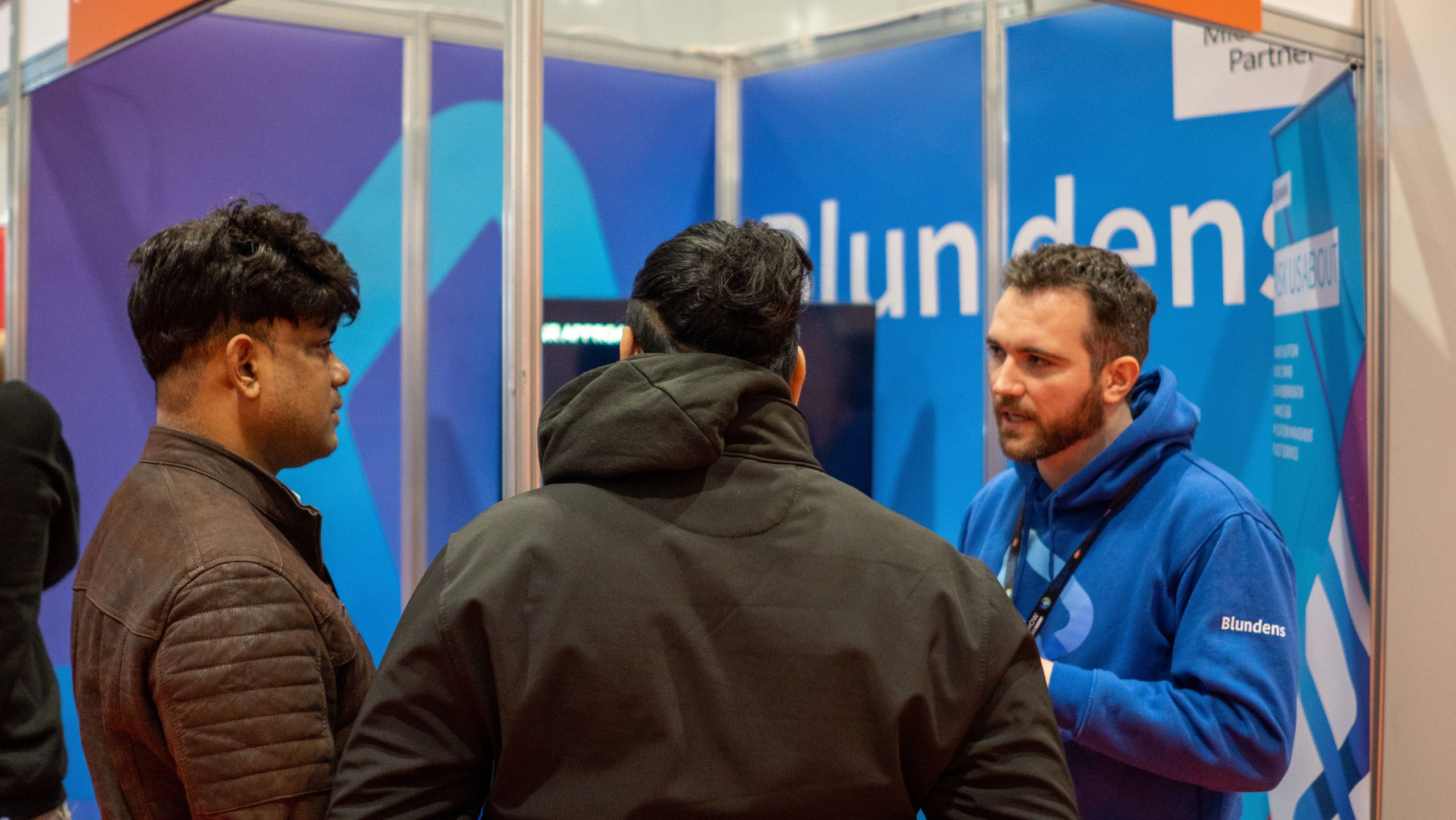 people standing and talking